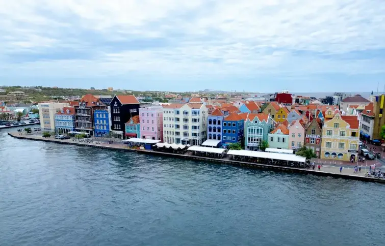 Willemstad Highlights & History Tour in Curaçao — Tour a UNESCO World Heritage city in air-conditioned luxury. Colorful colonial architecture, historic bridges, and hidden local street art.